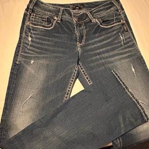 Silver Suki bootcut jeans. Blue denim distressed. Size 29W/33L